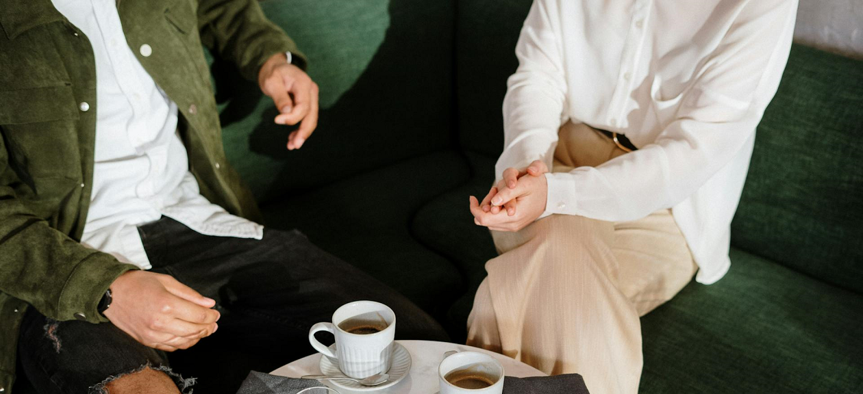 A man and a woman on a coffee date.